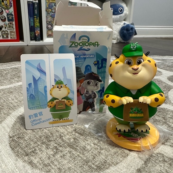 Disney Other - Disney Zootopia 2 Officer Clawhauser Popmart figurine with card and box